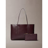 Calvin Klein
COATED EMBLEM - Handbag - fudge aop